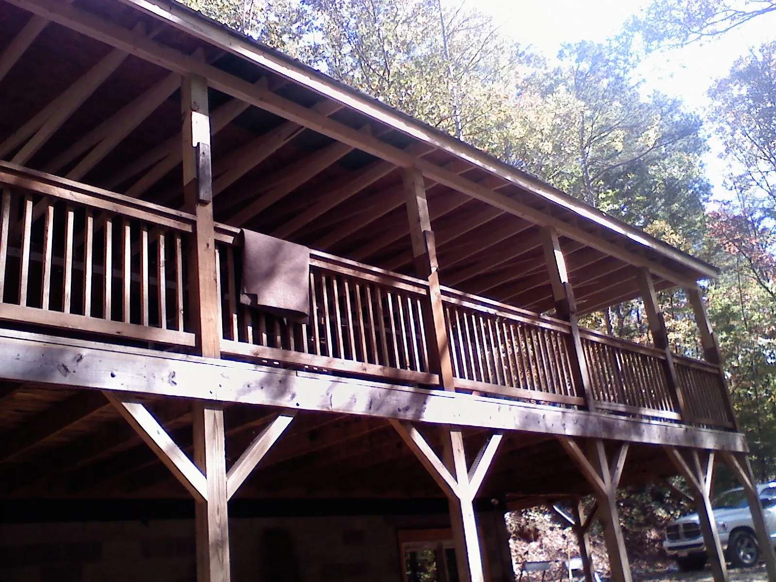 Timber framing under a new elevated porch and deck — Roof Leak Repair in Demotte by Roofing Brothers